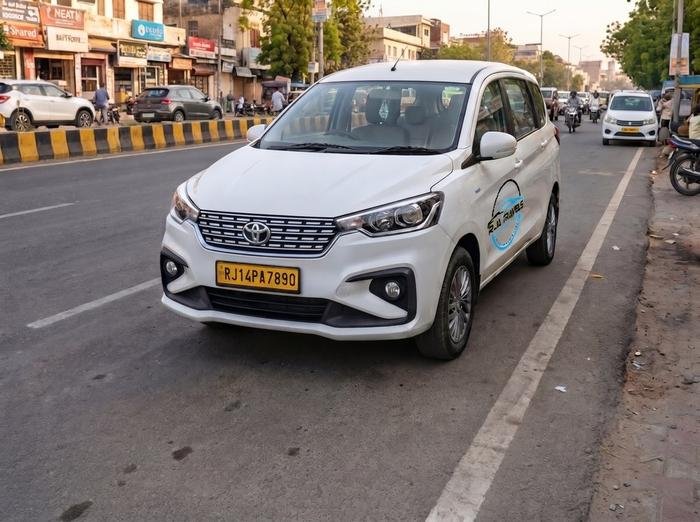 White Toyota Rumion for Jaipur city tours